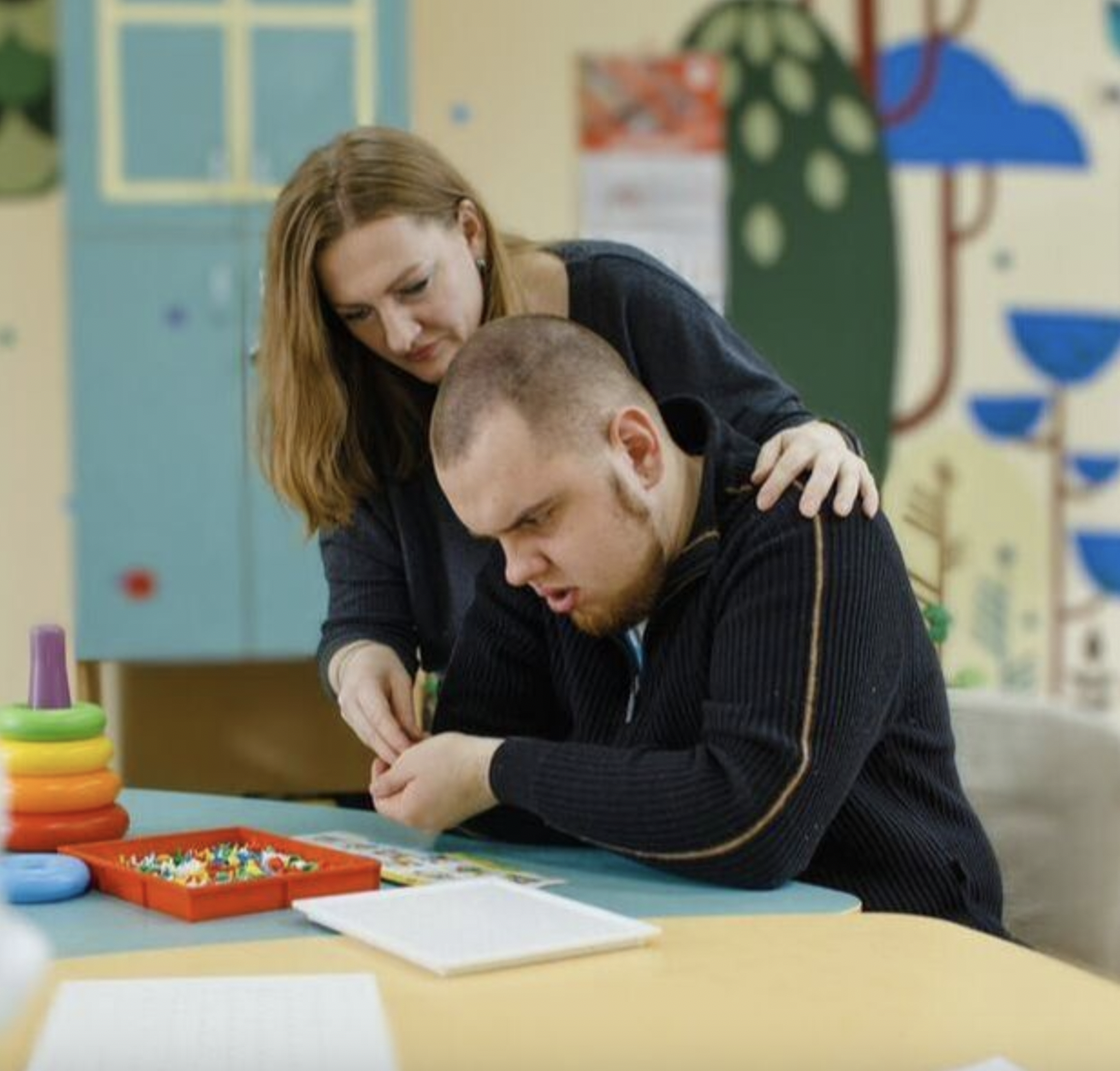 Therapist working with client